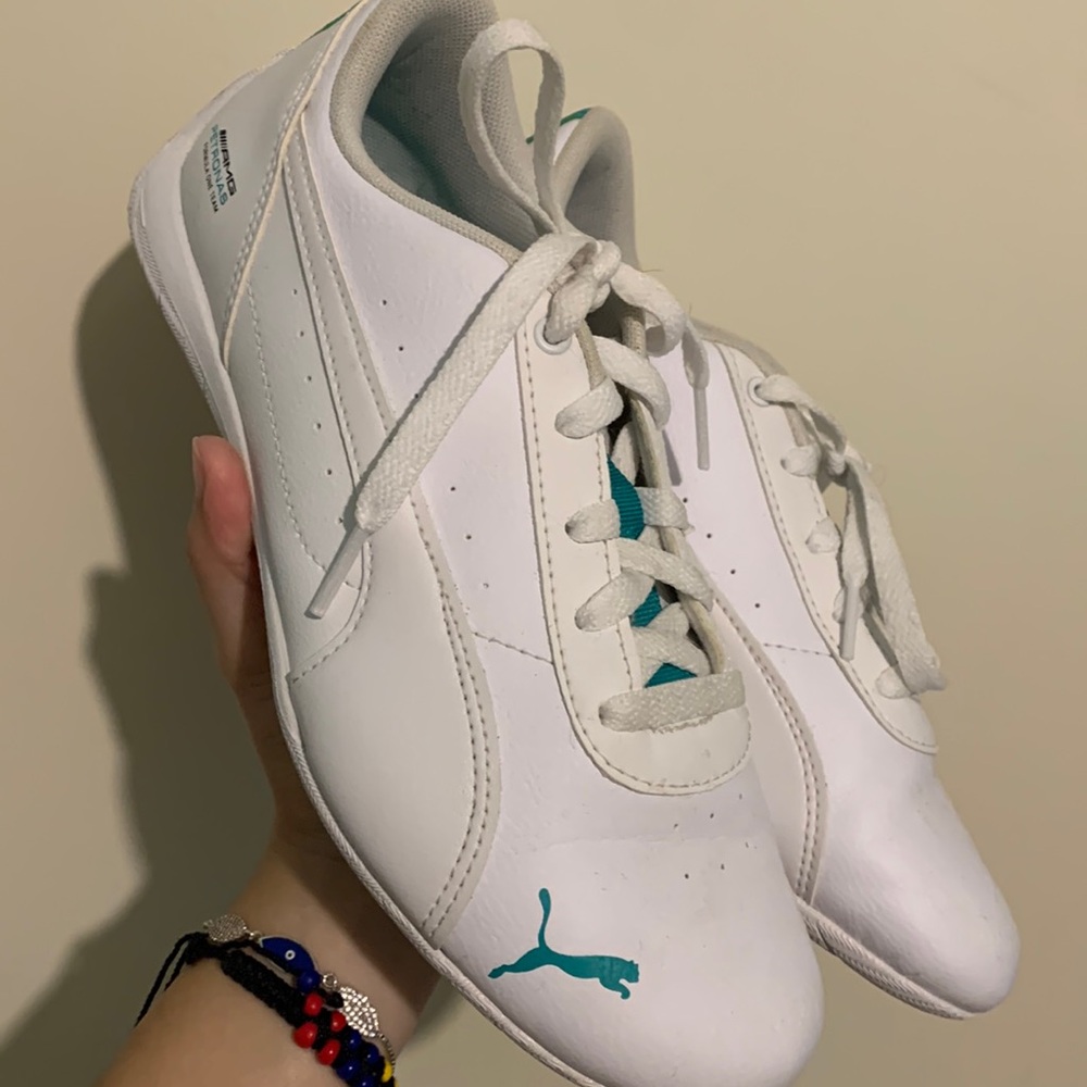 White and teal Puma shoes